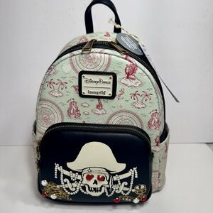 NWT. Loungefly Disney Parks Pirates Of The Caribbean Glow Mini Backpack